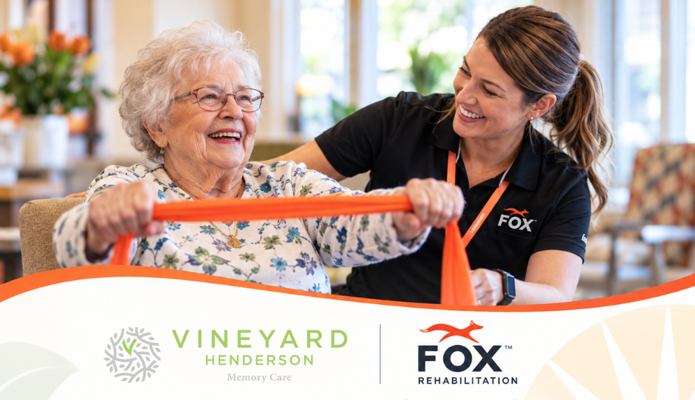 Senior woman exercises with therapist using an orange resistance band.